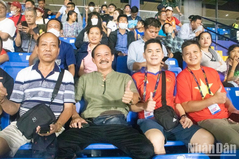 Vietnamese football fans at the match. Vietnamese football fans at the match.