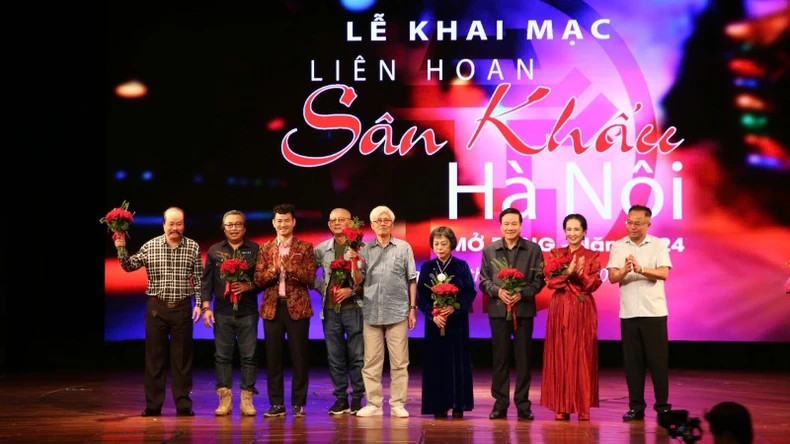 Presenting flowers to members of the festival jury. Presenting flowers to members of the festival jury.