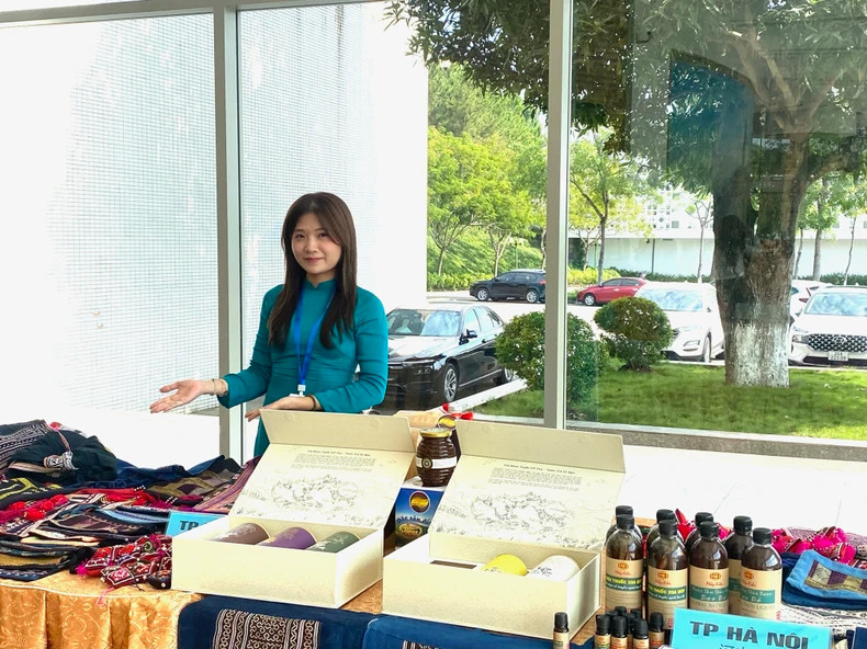 A booth displaying Vietnamese products at the conference. A booth displaying Vietnamese products at the conference.