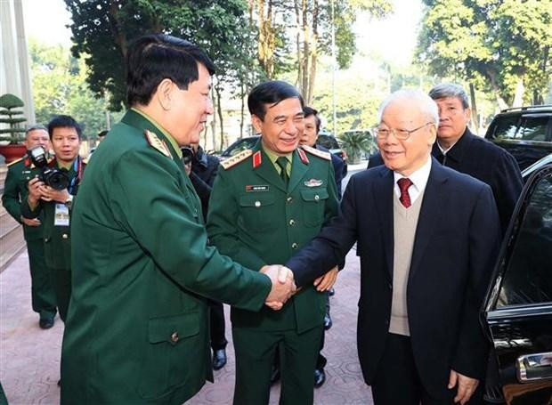 Party General Secretary Nguyen Phu Trong (R) shakes hands with officers from the Ministry of National Defence. (Photo: VNA) Party General Secretary Nguyen Phu Trong (R) shakes hands with officers from the Ministry of National Defence. (Photo: VNA)