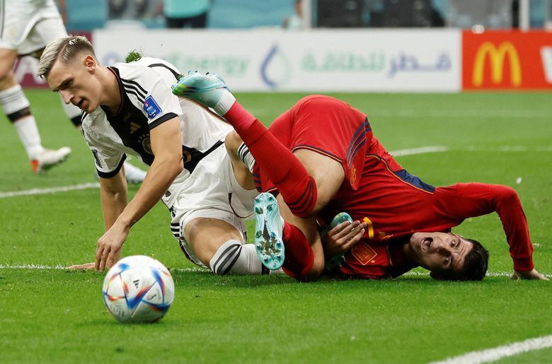 Spain's Alvaro Morata in action with Germany's Nico Schlotterbeck. REUTERS/Albert Gea