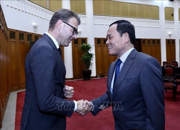 Deputy Prime Minister Tran Luu Quang and Chairman of the European Parliament Delegation for Relations with the Countries of Southeast Asia and ASEAN Daniel Caspary. (Photo: VNA)