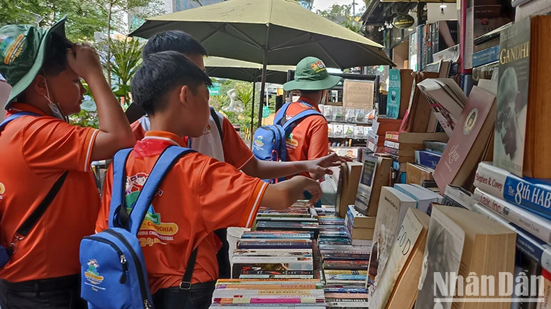 Children visit book stalls at Ho Chi Minh City Book Street.
