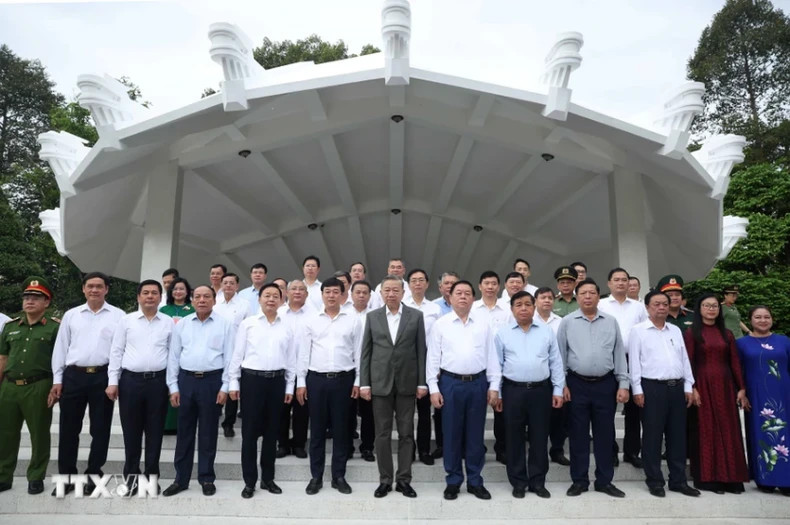 General Secretary To Lam and delegates at the Nguyen Sinh Sac Memorial Site.