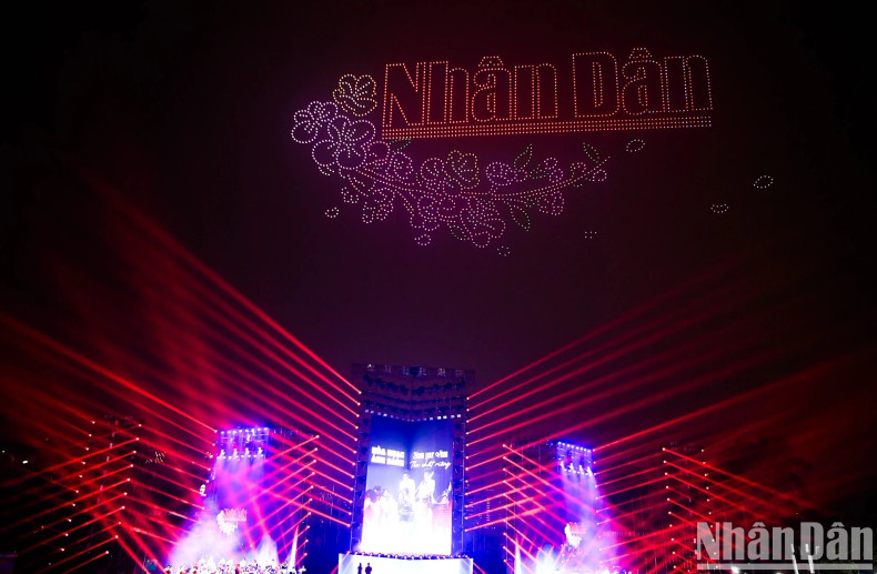 The logo of Nhan Dan Newspaper shines brightly.