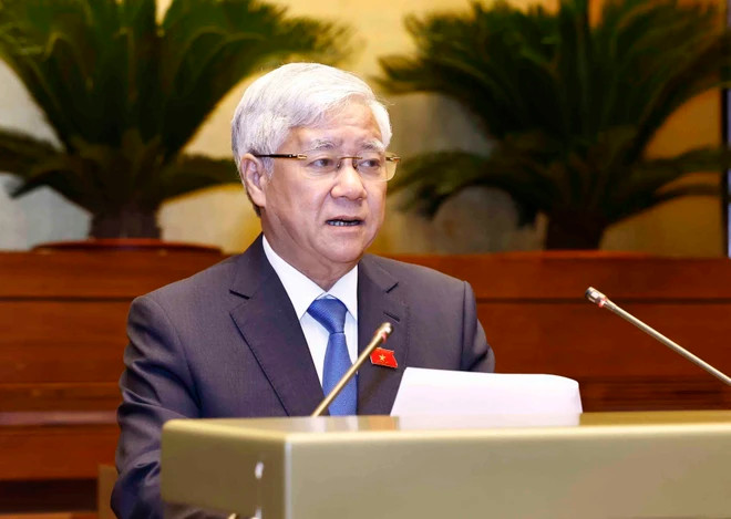 President of the Vietnam Fatherland Front (VFF) Central Committee Do Van Chien delivers a report at the 8th sitting of the 15th NA. (Photo: VNA) President of the Vietnam Fatherland Front (VFF) Central Committee Do Van Chien delivers a report at the 8th sitting of the 15th NA. (Photo: VNA)