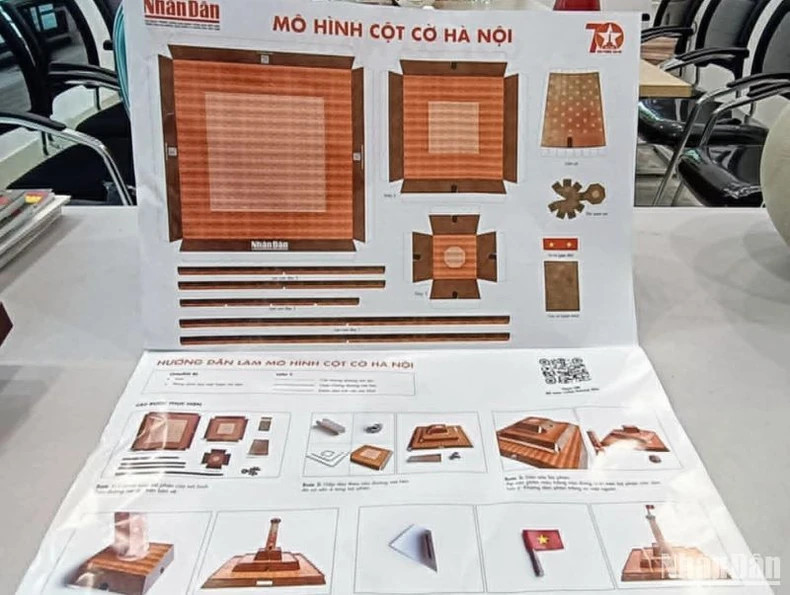 Readers using scissors to cut and paste images on the publication. Readers using scissors to cut and paste images on the publication.