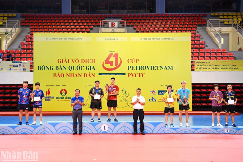 The delegates presented medals and trophies to the winners in the mixed doubles event. The delegates presented medals and trophies to the winners in the mixed doubles event.
