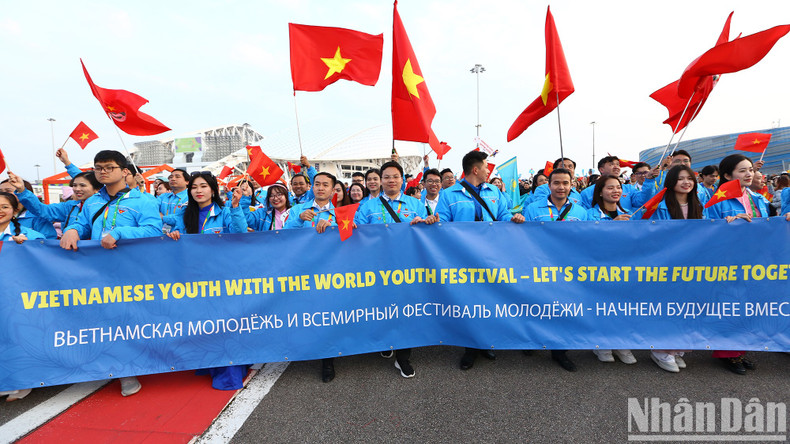 They also carry a banner that reads: ‘Vietnamese Youth with the World Youth Festival – Let’s Start the Future Together’. They also carry a banner that reads: ‘Vietnamese Youth with the World Youth Festival – Let’s Start the Future Together’.