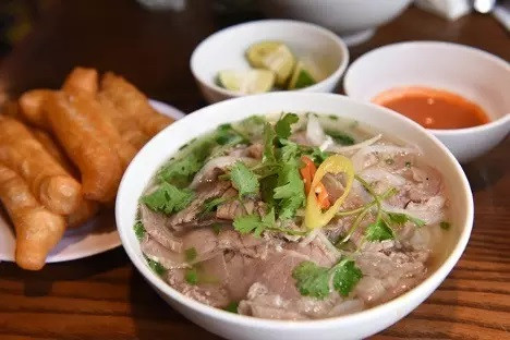 Hanoi's pho bo (noodle soup with beef) is named the best Hanoi street food dishes to sample Hanoi's pho bo (noodle soup with beef) is named the best Hanoi street food dishes to sample