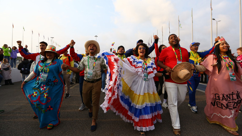 The Vietnamese delegates join more than 20,000 others from all over the world in a mass parade at Sirius Olympic Park on March 4. The Vietnamese delegates join more than 20,000 others from all over the world in a mass parade at Sirius Olympic Park on March 4.