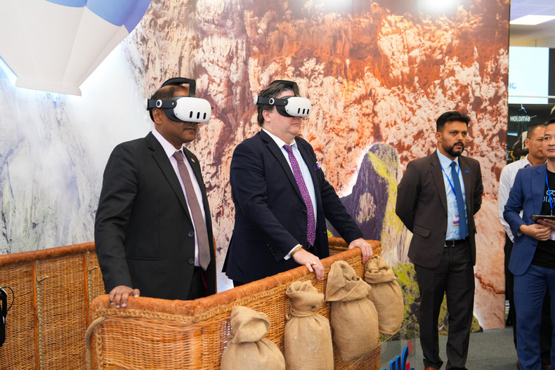 Visitors enjoy a VR (Virtual Reality) tour exploring Son Doong Cave - the largest natural cave in the world.