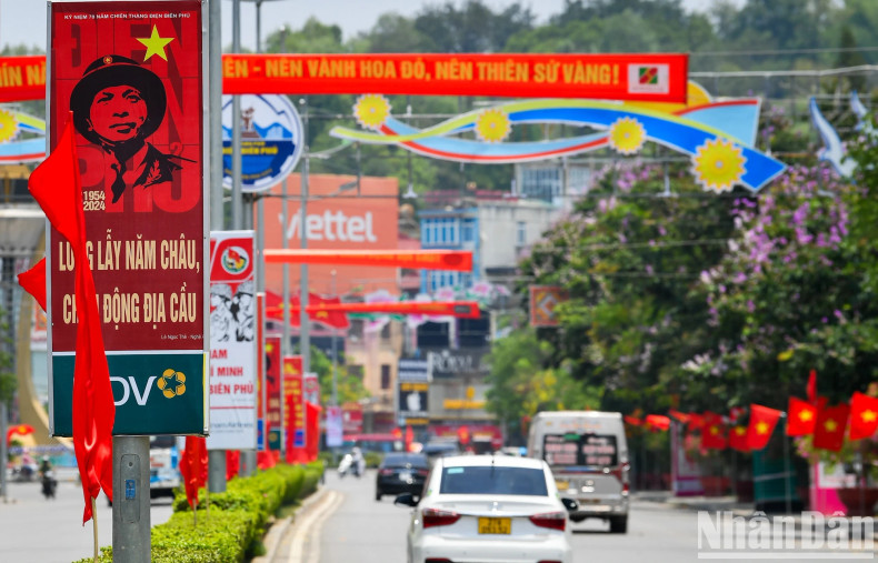 A poster featuring the portrait of General Vo Nguyen Giap is hung on the road named after him in Dien Bien Phu City.