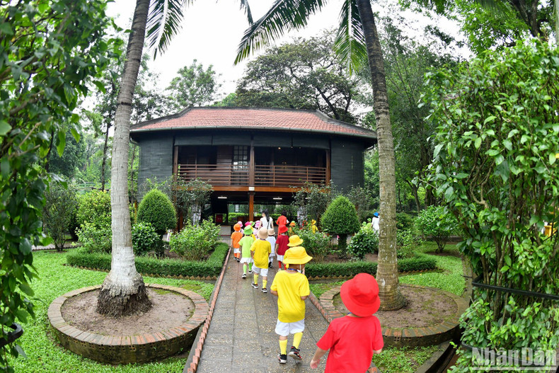 Surrounding the stilt house is a garden with plants brought from all over the nation.