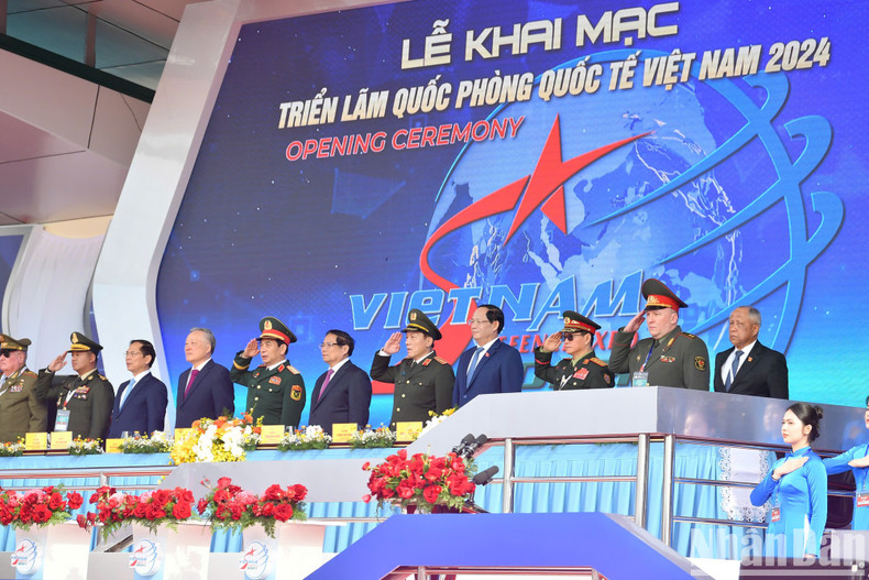 Prime Minister Pham Minh Chinh joins other delegates at the opening ceremony.