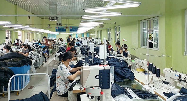 Textile and garment production at Nam Dinh Textile and Garment Joint Stock Corporation. Textile and garment production at Nam Dinh Textile and Garment Joint Stock Corporation.