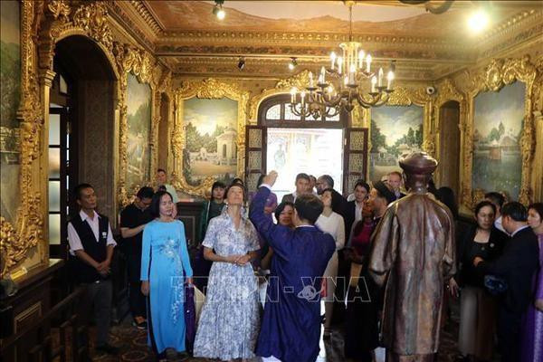 UNESCO Director-General Audrey Azoulay visits An Dinh Palace. (Photo: VNA)
