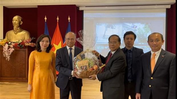 At the reception for Lao Embassy delegation (Photo: VNA)