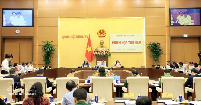 At the fifth meeting of the National Election Council. (Photo: VNA)