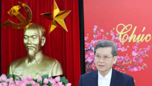 Politburo member, Secretary of the Party Central Committee and Chairman of the Party Central Committee’s Commission for Internal Affairs Le Minh Tri speaks at the meeting. (Photo: VNA)