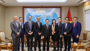 Deputy Prime Minister Ho Duc Phoc and other delegates at the reception. (Photo: The Courtesy of Prudential)