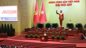 A plenary discussion on Congress documents on the morning of January 21. (Photo: VNA)