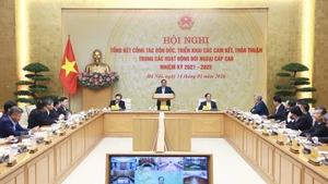 Prime Minister Pham Minh Chinh chairs a conference on January 14 to review the follow-up and implementation of the international agreements and commitments in 2021 - 2025 (Photo: VNA)