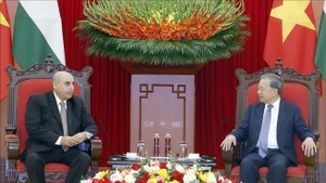 Party General Secretary To Lam (right) receives Speaker of the Jordanian House of Representatives Mazen Turki El Qadi in Ha Noi on February 3. (Photo: VNA)
