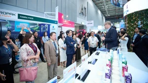 Visitors learn about technology solutions at ProPak Viet Nam 2025.
