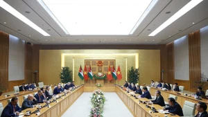 At the meeting between Prime Minister Pham Minh Chinh and Speaker of the Jordanian House of Representatives Mazen Turki El Qadi in Ha Noi on the morning of February 3. (Photo: VNA)