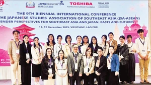 Lecturers and students of the Faculty of Oriental Studies at the University of Social Sciences and Humanities (Viet Nam National University, Ha Noi) attend an international conference in Laos in December 2025.