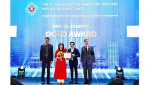 Representatives of MedCAT receive the Gold Award at the ASEAN Digital Awards 2026. Photo: THUY LINH