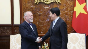 State President Luong Cuong (R) meets with Czech Ambassador to Viet Nam Hynek Kmonicek on February 3. (Photo: VNA)