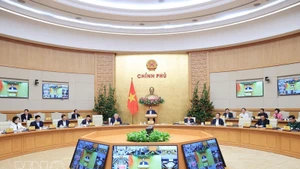 An overview of the Government’s regular meeting on March 4. (Photo: VNA)