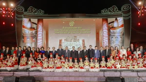 Delegates at the ceremony to receive UNESCO’s recognition of Ha Noi as a member of the Global Network of Learning Cities. (Photo: VNA)