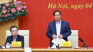 Prime Minister Pham Minh Chinh, Secretary of the Government Party Committee, speaks at the event. (Photo: VNA)