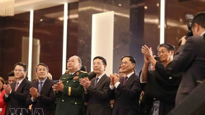 From left: Minister of Science and Technology Nguyen Manh Hung (fourth), Deputy Prime Minister Bui Thanh Son (fifth), Japanese Ambassador Ito Naoki (sixth), and delegates at the reception in Ha Noi on March 3 to celebrate the 66th birthday of His Majesty Emperor Naruhito. (Photo: VNA)