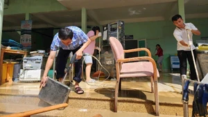 Cleaning and disinfecting medical equipment at Khanh Hoa Hospital for Tropical Diseases.