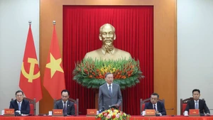 Party General Secretary To Lam (standing) addresses the reception. (Photo: VNA)