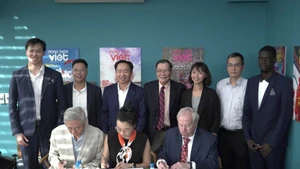 Representatives from both sides sign a memorandum of understanding on cooperation.