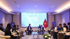 Deputy Prime Minister Bui Thanh Son receives Lao Deputy Minister of Technology and Communications Saysana Sitthiphone on the occasion of his attendance at the 2025 Autumn Economic Forum in Ho Chi Minh City. (Photo: VNA)