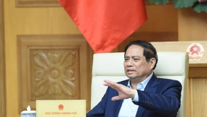 Prime Minister Pham Minh Chinh chairs a meeting with ministry and sector leaders on preparations for the exhibition, to be held in celebration of the 80th anniversary of the National Day (September 2, 1945 –2025). (Photo: nhandan.vn)