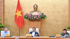 Prime Minister Pham Minh Chinh chairs the July Government session on law-making.