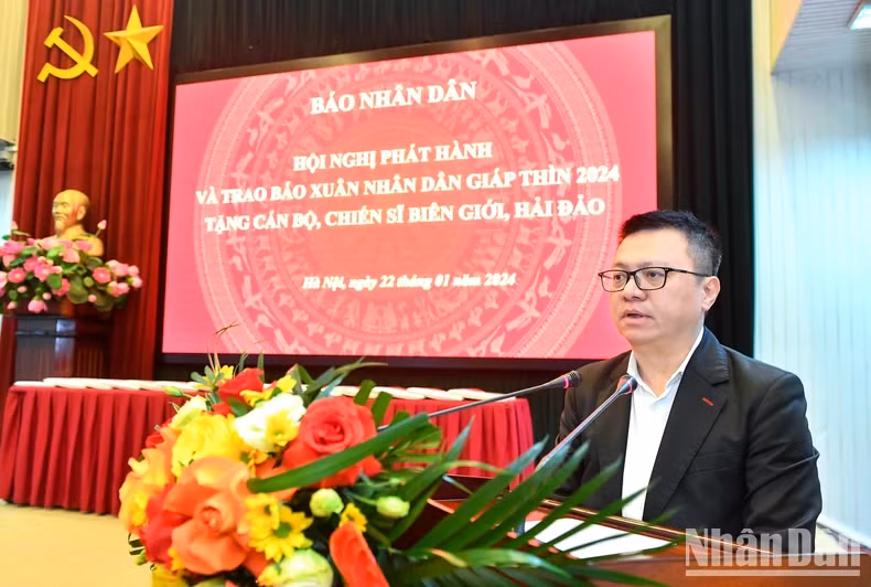 Editor in Chief of Nhan Dan Newspaper Le Quoc Minh speaking at the event. (Photo: NDO)