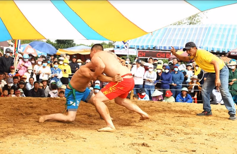 Wrestlers compete in a match