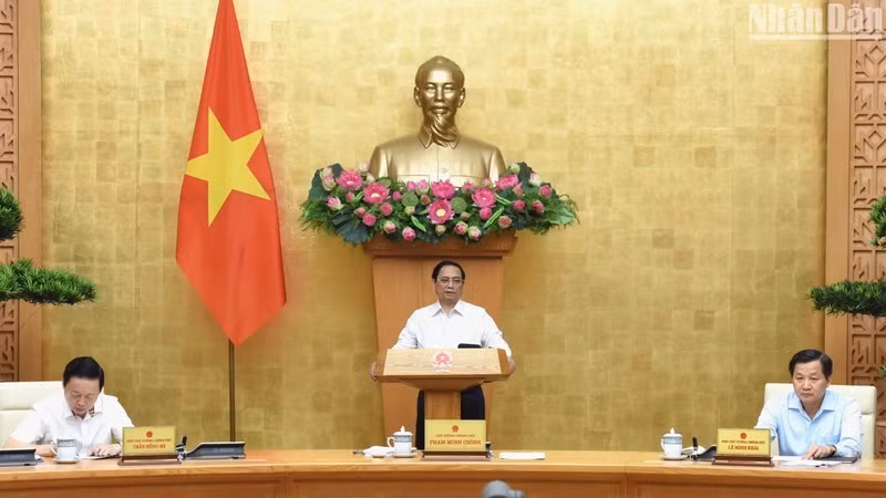 Prime Minister Pham Minh Chinh chairs a Government session on law-building on July 26. (Photo: NDO)