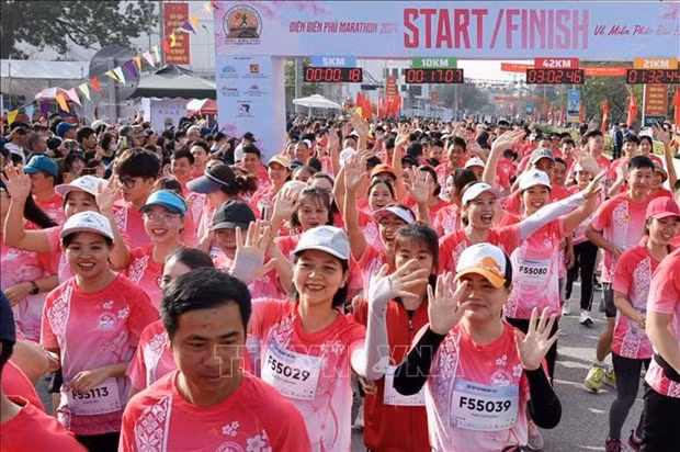 Runners in 5km race (Photo: VNA)