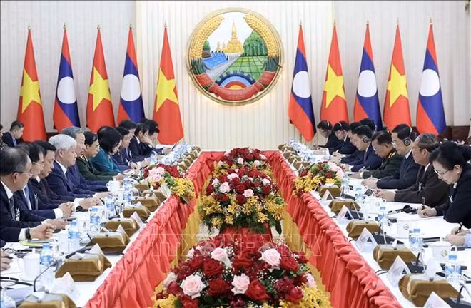 Participants at the meeting (Photo: VNA)