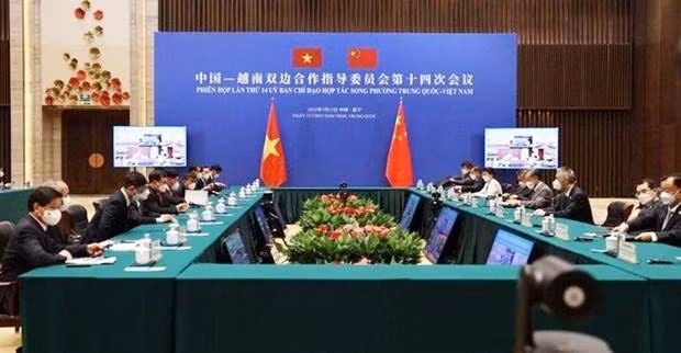 A meeting of the Steering Committee for Bilateral Cooperation in July 2022 (Photo: VNA)