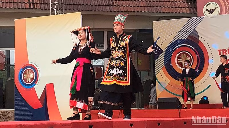 Performance of national costumes at the Vietnam National Village for Ethnic Culture and Tourism.